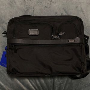 Tumi expandable black briefcase new without tags!